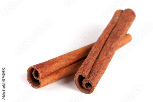 Fotografie, Obraz two cinnamon sticks isolated on white background