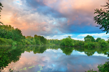 Wall Mural - sunset on the lake with forest