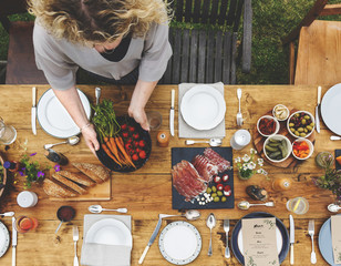 Woman Preparing Table Dinner Concept