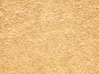 Wall Mural - Background texture of beige gold plaster walls.