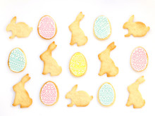 Pattern With Homemade Easter Cookies On White Background. Top View, Easter Card.