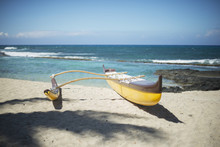 Outrigger Canoe On The Beach; Island Of Hawaii, Hawaii, United States Of America