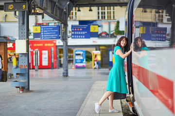 Canvas Print - Young woman in underground or railway station