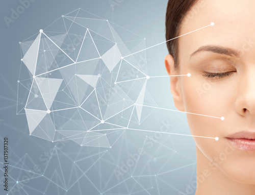 Cuadros en Lienzo beautiful woman half face with low poly projection