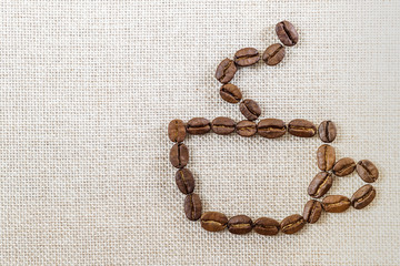 Wall Mural - Burlap Sackcloth Canvas and Coffee Beans Photo Background. Copy Space. Coffee Border