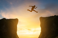 Man Jumping Over The Cliff, Silhouette