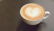 © ningjetaime - Vintage latte art coffee. Heart shape latter art in white cup