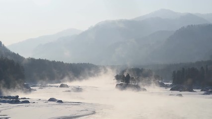 Wall Mural - steam over a mountain river, winter, frosty sunny day.