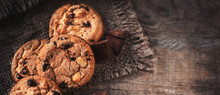 Chocolate Chip Cookies On Dark Old Wooden Table With Place For Text.,  Freshly Baked. Selective Focus With Copy Space.