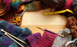 Border of colourful knitting and craft accessories