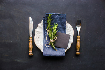 Table setting with rosemary