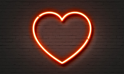 Wall Mural - Heart neon sign on brick wall background.