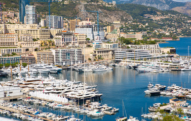 Wall Mural - Principality of Monaco. View of the seaport and the city of Monte Carlo with luxury yachts and sail boats 