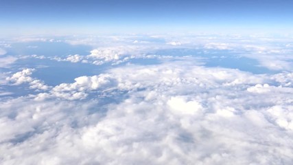 4k traveling by air. wonderful view of the sky and clouds with the light the sun from above, as seen