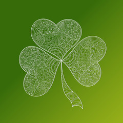 Greeting card for St. Patrick's Day with shamrock on the green background. Hand draw doodle clover. Vector illustration.