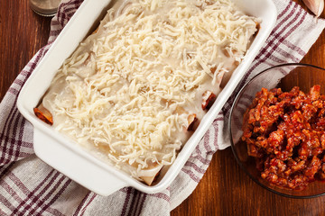 Cannelloni stuffed with meat cooked in a casserole dish ready fo