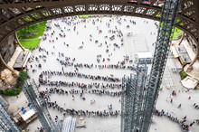 Line Of People For Entrance On The Eiffel Tower Paris, France