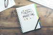 Digital marketing written on notebook