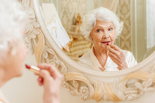 Old Lady Doing Make-up At Home