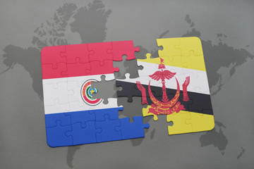 puzzle with the national flag of paraguay and brunei on a world map