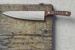 Kitchen knife with a wooden handle