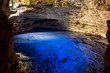 Poco Encantado, blue lagoon with sunrays inside a cavern in the Chapada Diamantina, Brazil