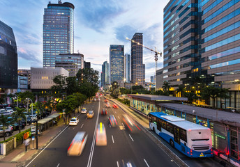 Poster - Traffic rushing in Jakarta business district in Indonesia capital city