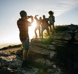 Wall Mural - friends on hike together in the countryside