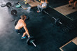 © Jacob Lund - Muscular man exercising with heavy weights in gym