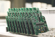Computer board with chips at the factory for the production of computer components.