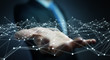 © sdecoret - Dot flying network held by businessman 3D rendering