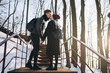 © Romvy - Love hipster couple man and woman with black clothes walking in the city