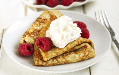 Canvas Print - Crepes with raspberries and whipped cream