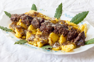 Polenta with wild boar stew