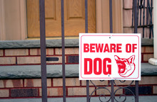 Beware Of Dog Sign On Gate