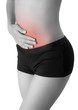 © kintarapong - Woman touch on her belly in pain area black and white color with red highlight isolated on white background