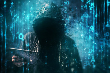 Wall Mural - Computer hacker with hoodie in cyberspace surrounded by matrix code
