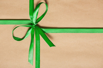 gift box with satin green ribbon and  bow