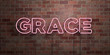 GRACE - fluorescent Neon tube Sign on brickwork - Front view - 3D rendered royalty free stock picture. Can be used for online banner ads and direct mailers..