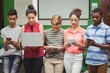 © WavebreakMediaMicro - Students using laptop, mobile phone, digital tablet