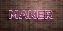 MAKER - Fluorescent Neon Tube Sign On Brickwork - Front View - 3D Rendered Royalty Free Stock Picture. Can Be Used For Online Banner Ads And Direct Mailers..
