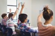 © WavebreakMediaMicro - Student raising hand in classroom