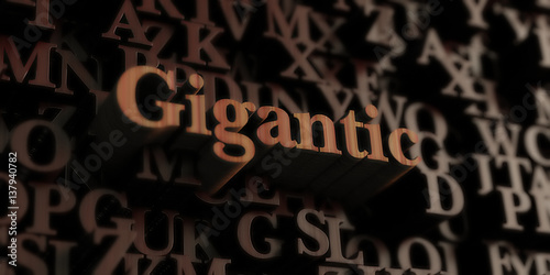 Foto  Gigantic - Wooden 3D rendered letters/message