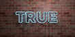 TRUE - fluorescent Neon tube Sign on brickwork - Front view - 3D rendered royalty free stock picture. Can be used for online banner ads and direct mailers..