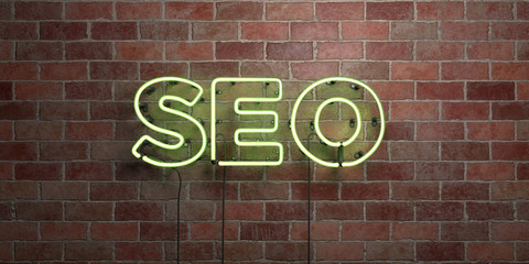 Fototapete - SEO - fluorescent Neon tube Sign on brickwork - Front view - 3D rendered royalty free stock picture. Can be used for online banner ads and direct mailers..
