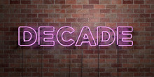 DECADE - Fluorescent Neon Tube Sign On Brickwork - Front View - 3D Rendered Royalty Free Stock Picture. Can Be Used For Online Banner Ads And Direct Mailers..