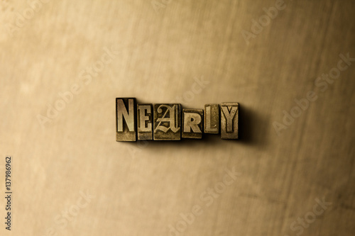 Fotografie, Obraz NEARLY - close-up of grungy vintage typeset word on metal backdrop
