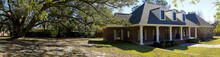 Panoramic Southern Home With Dormers And Oak Tree