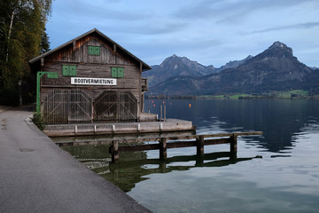 Wall Mural - View of lake and mountains from pier, Alps