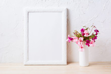 White Frame Mockup With Pink And Purple Flower Bouquet